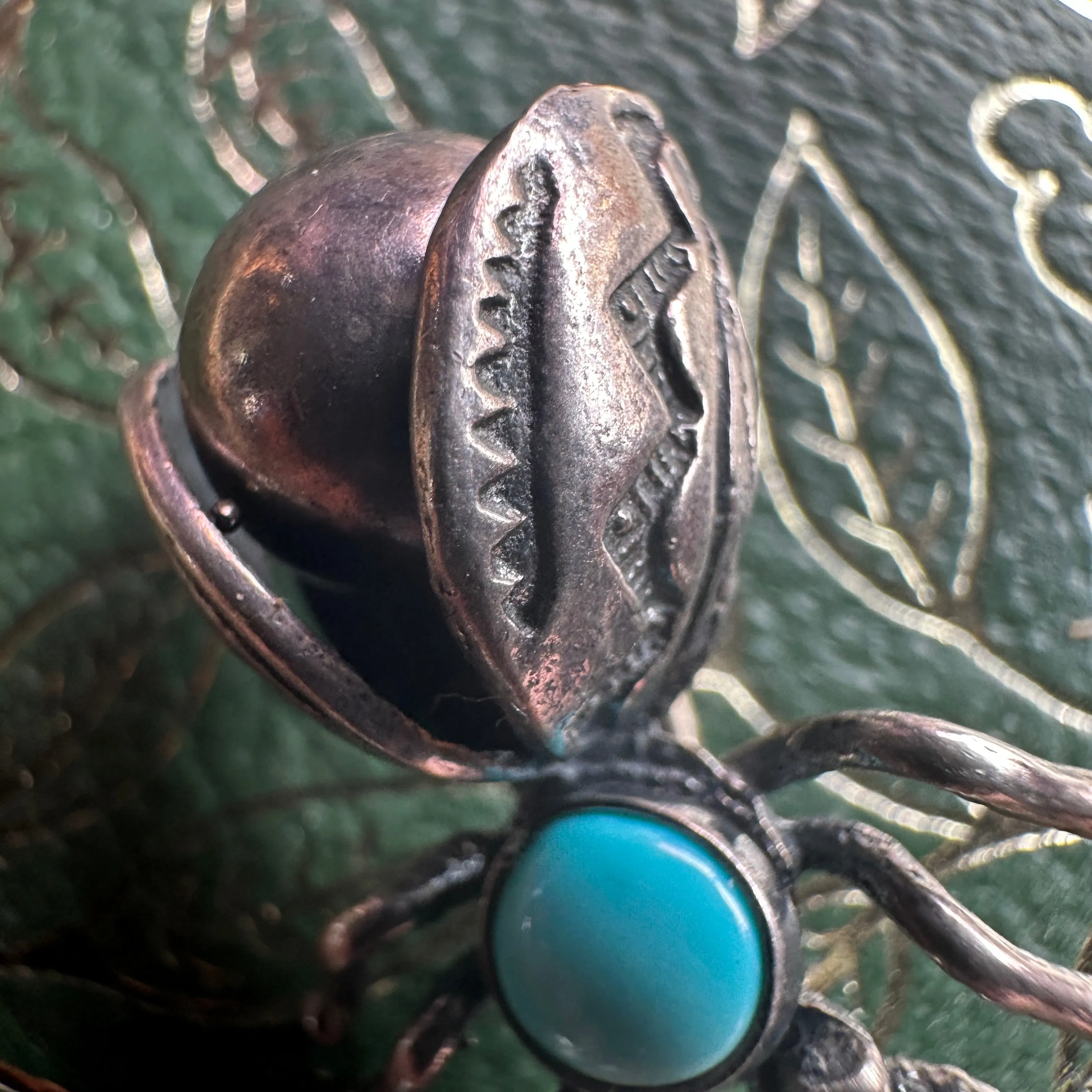 vintage sterling silver and turquoise Navajo firefly brooch